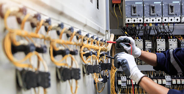 Professional Electrician technician working in Weaver, AL
